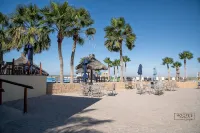 Oceanfront ground level condo on a Private Beach in a lovely resort!