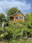 Bright and charming cabin on the Cabot Trail overlooking St. Ann’s bay.