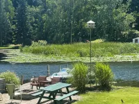 Resort cottages on 650’ of frontage to Hamlin lake. Hotel a Hamlin Township