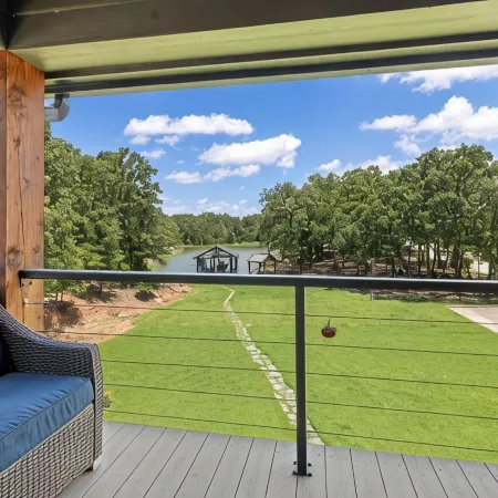 Richland Chambers Lakefront 2-story home with boat dock and pavilions.
