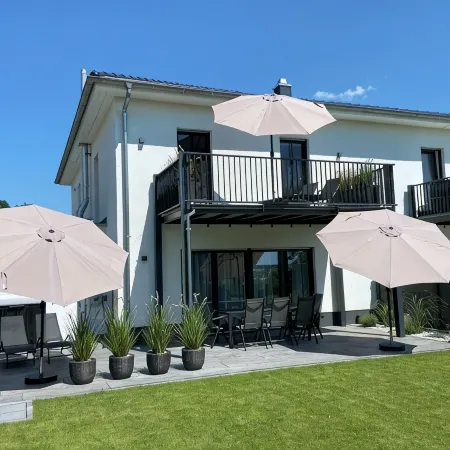 8P "Seegelblick" Vacation Home on the Waterfront with a Hot Tub, Sauna, and Fireplace Hotels in Pouch