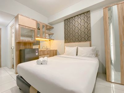Basic Studio at Candiland Apartment By Travelio