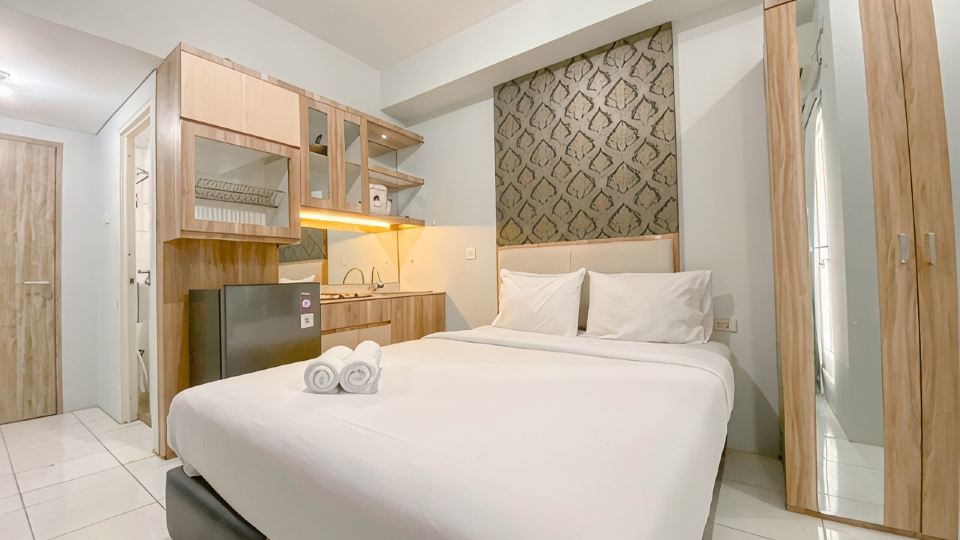 Basic Studio at Candiland Apartment By Travelio
