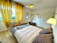 Maison Chaleureuse Avec Jardin - Homestays