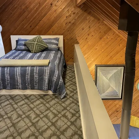 Mid-century A-frame style cabin with lake views near the heart of Amish Country