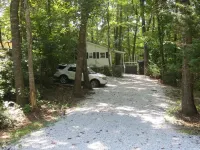 LAKEFRONT Retreat! <br>Escape To Lake Hartwell in this lakeside cottage!