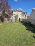 Maison en Centre-ville Avec Jardin Privatif
