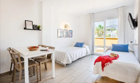 Apartamentos Flor Los Almendros Отели в г. Пагера