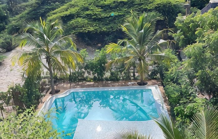 Dive in to our pool and feel the breeze at Mbibo House in the Shela sand dunes