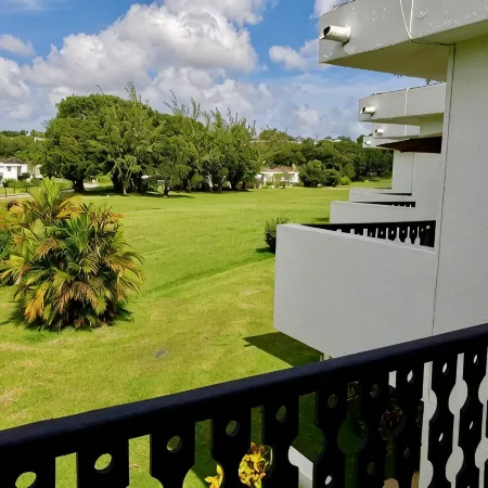 Peaceful intensely clean unit overlooking tropical gardens and golf course