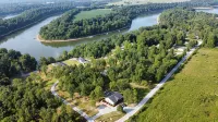 Porch-lovers Paradise! SLEEPS 11-12. Multiple fire pits. Only 0.8mi to boat ramp