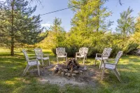 "Home Away From Home" nestled into five private acres on an all sports lake!