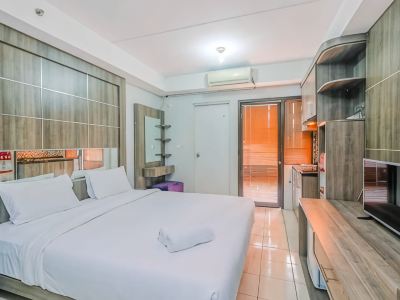 Elegant Studio Apartment @ Metropark Condominium Jababeka by Travelio