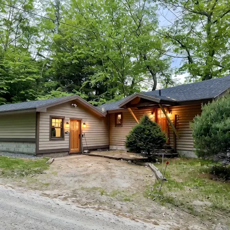 Lakefront cabin with dock, hot tub, fire pit!!