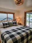 NEW! Renovated Bungalow steps from Lake Tomahawk - King Bed, Dock Space, Firepit - 4-Star