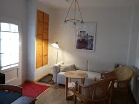 Vacation apartment near the national park and harbor with terrace and parking space