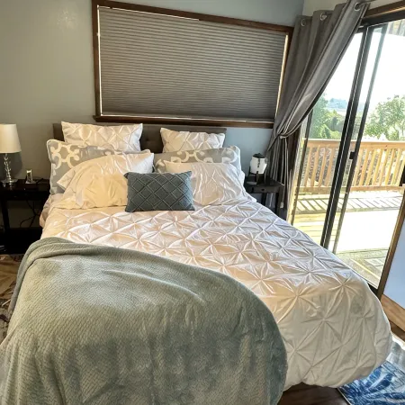 Expansive views of iconic McCullough Bridge, and bay with beautiful sunsets