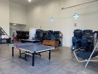 Riverfront with private dock, river views from every room & arcade games! - Wifi