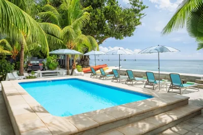 Le Nautique Beachfront Apartments Hotels in Takamaka