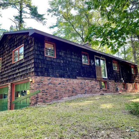 NEW! Charming 3BR/2BA Lake House in the Woods of the desirable Black River area