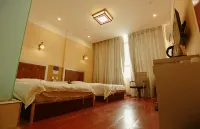 Ruoqi Ancient City Business Hotel - พร้อมWifi
