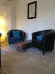 Spacious vacation apartment with fireplace and barrel sauna in the sheltered garden.