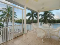 Large home on private penninsula with waterfront and views on three sides.