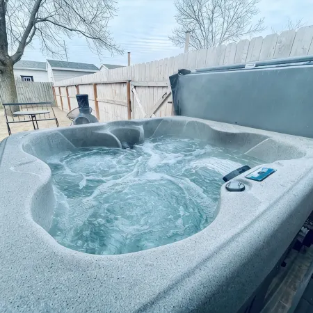 Luxury Suite • Private Yard • Hot Tub • King Bed