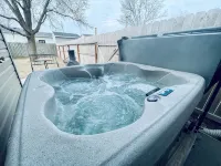 Luxury Suite • Private Yard • Hot Tub • King Bed