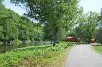 Spectacular Catskill Mountain River Front Custom Log Home