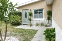 Unique waterfront home, Hot Tub, private boat dock,  walk to beach, pet friendly