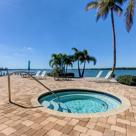 Waterfront Condo w/ Pool & Hot Tub! Mins to Beach!
