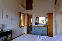 Spacious villa in extensive private grounds overlooking Ahai bay near Erimitis - Boutique