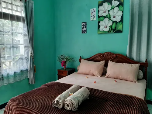 นิว ตะมัน สารี โฮมสเตย์ - ที่มีที่จอดรถ