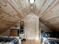Riverfront Cabin : The Cozy Brown Trout Lodge Hotels in Oscoda County
