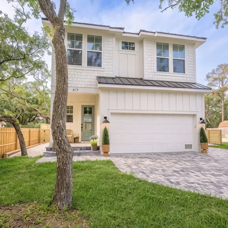 BRAND NEW 4-bedroom, 2 primary suites, heated pool, steps to the beach and river