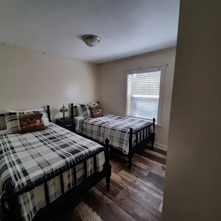 Cozy nestled in quiet neighborhood. On snowmobile and ATV trail.