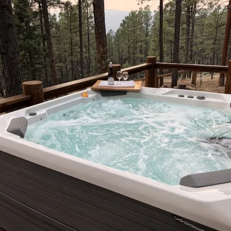 Walk to ski & trails! Luxury lodge, sleeps 17, hot tub, fire pit & fenced yard.