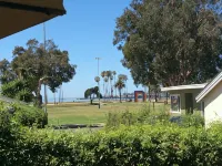Steps to the Sand: Enjoy beach views & a private fenced yard. Great for families - Tiny houses