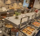 Luoyue Time Wenquan Homestay - servizio colazione