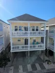 Coastal Comfort: 4-bedroom house with pool and sound access, 3 min walk to beach