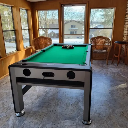 Spacious and cozy home with gas fireplace, boat dock, and lake views
