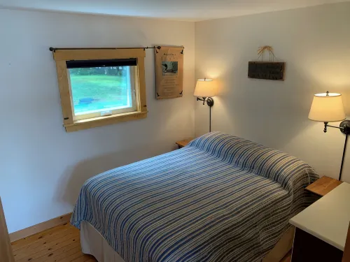 This beautiful cottage is set back 25 feet from Bog Lake in Northfield, Maine!
