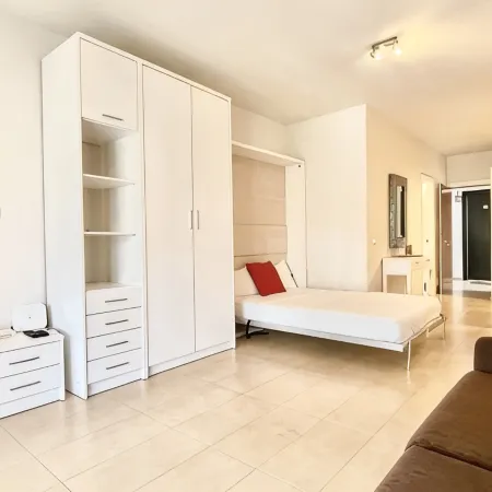Studio in front of the pool