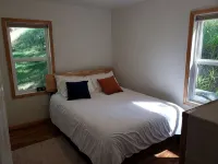Remodeled home in the woods, just past city limits. With horse pasture nearby!