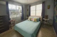 Private Pool and Swim up Bar-Immediately up the hill from Crashboat Beach! - balcony