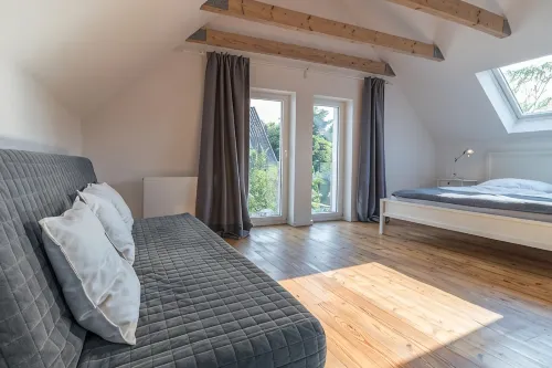 "Brunnenhaus": Stylish vacation home with Mediterranean courtyard and huge garden - Homestays