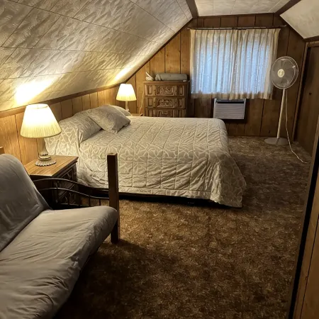 Cozy vacation home nestled in a quiet wooded area. Near town but private