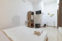 Ummi Home Syariah Mitra RedDoorz Hotel di Tegal Selatan