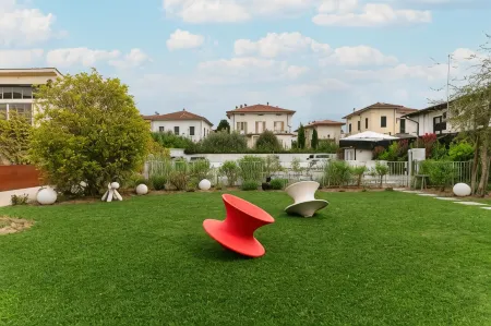 Villa Fedora Luxury Suites Отели рядом с достопримечательностью «Башня Гуиниджи»